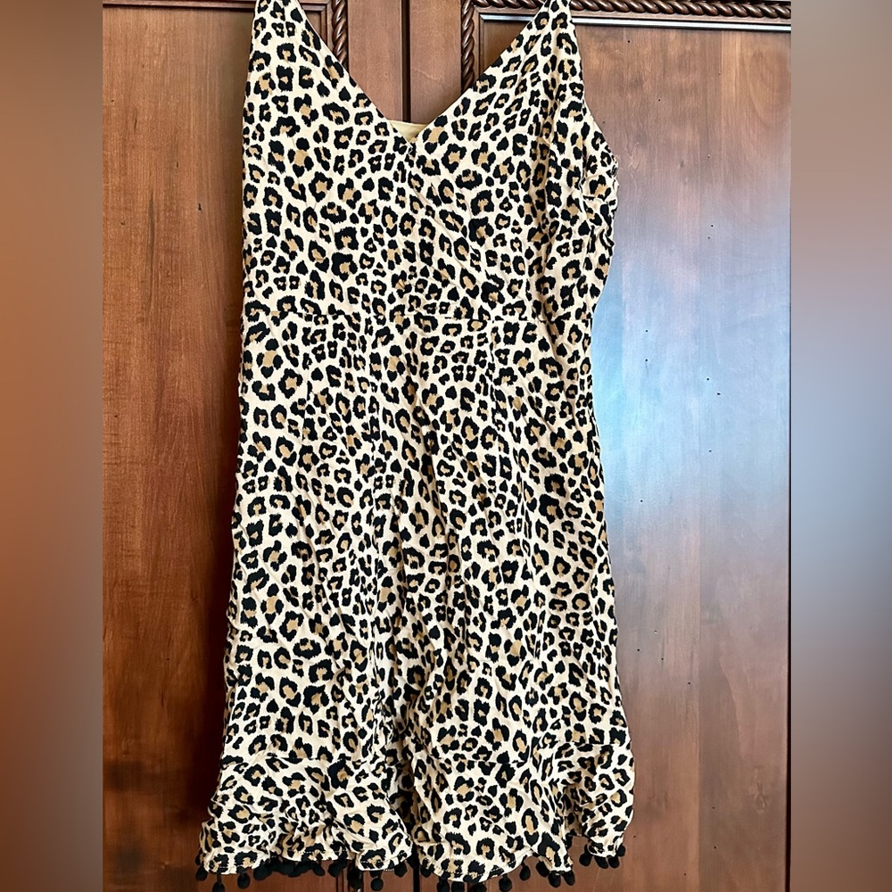 Mini Cheetah print dress with adjustable straps.